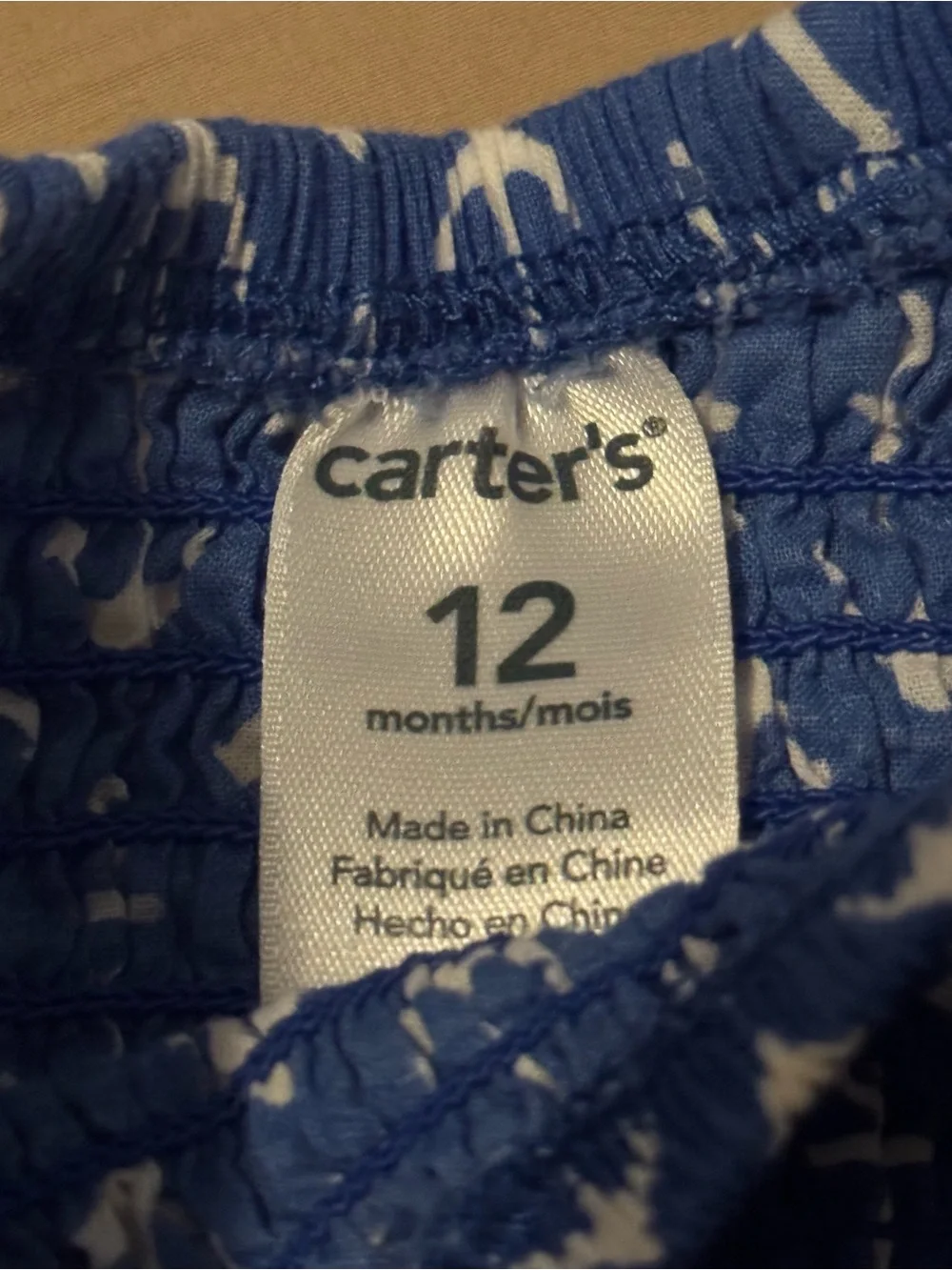 NWOT Carter’s Baby Girl Blue Anchor Smocked Top 12M